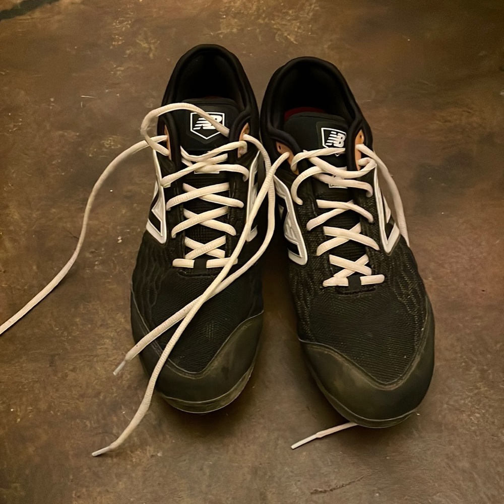 New Balance Baseball cleats. (Metal)